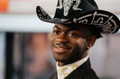 Lil Nas X Shares Nude Photos of Himself Posing in a Hot Tub.